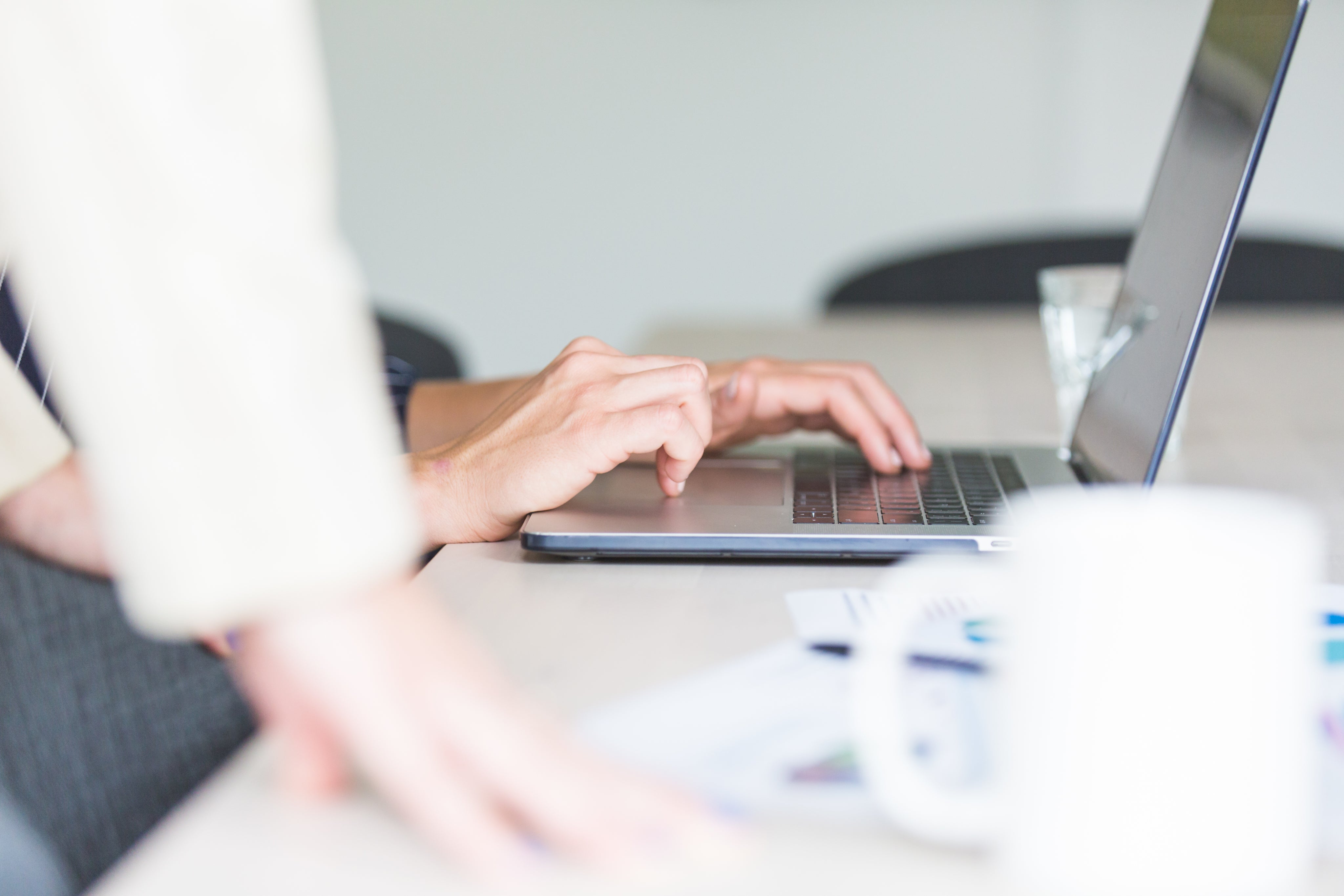 hands-using-computer-in-office.jpg